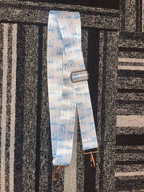Adjustable White Crossbody Strap with Light Blue Bow Print
